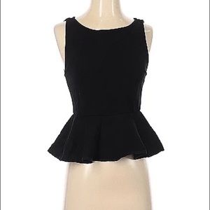 Alice + Olivia Sleeveless Black Top with Peplum
Size M
Item #11841572
